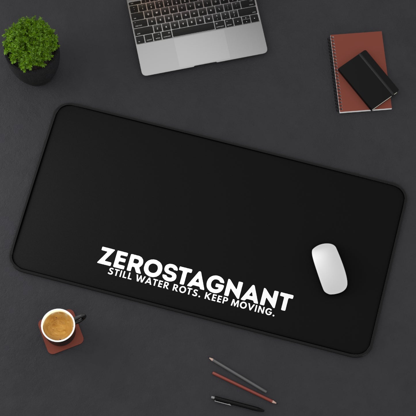 Desk Mat — "ZEROSTAGNANT: Still Water Rots. Keep Moving."
