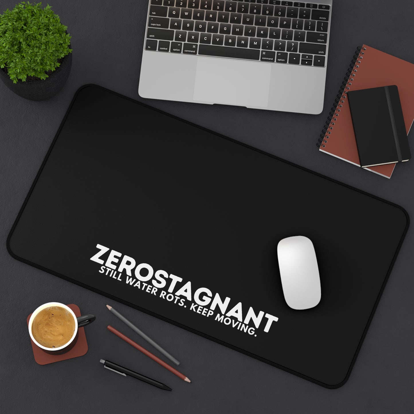 Desk Mat — "ZEROSTAGNANT: Still Water Rots. Keep Moving."