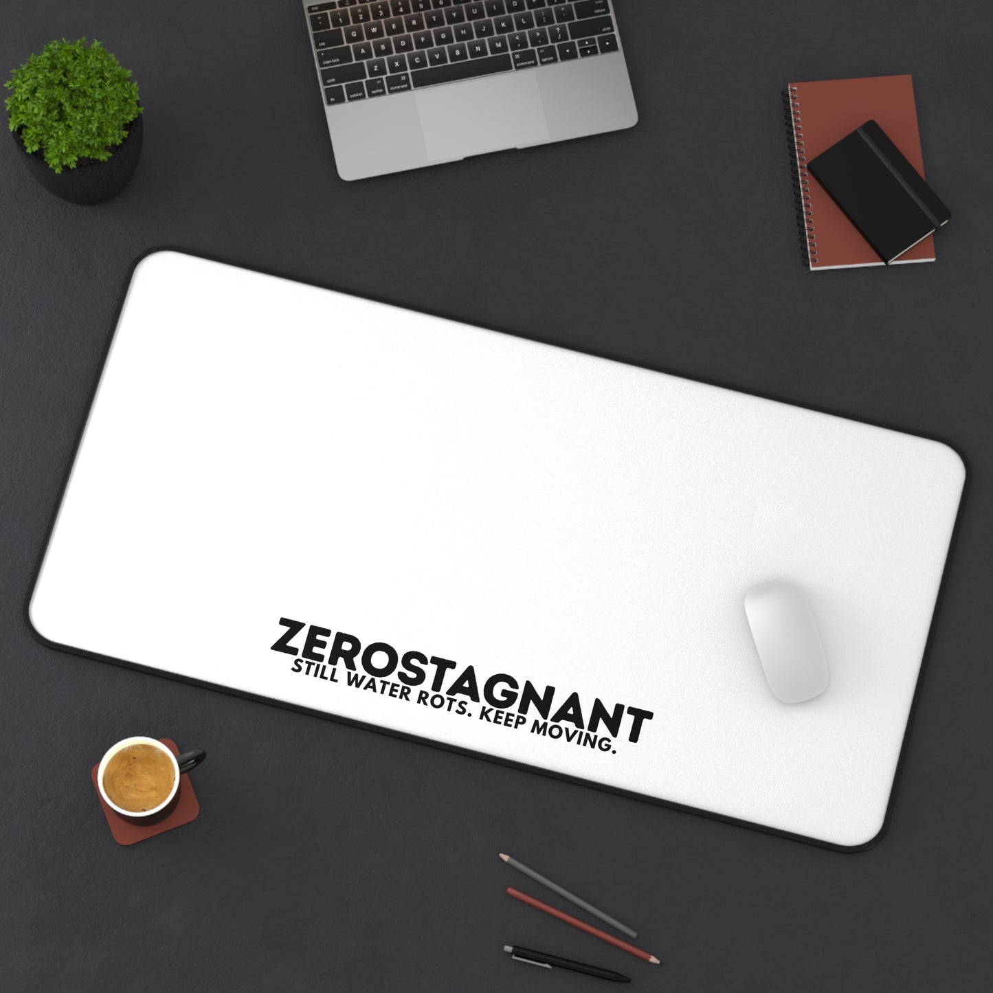 Desk Mat — "ZEROSTAGNANT: Still Water Rots. Keep Moving."