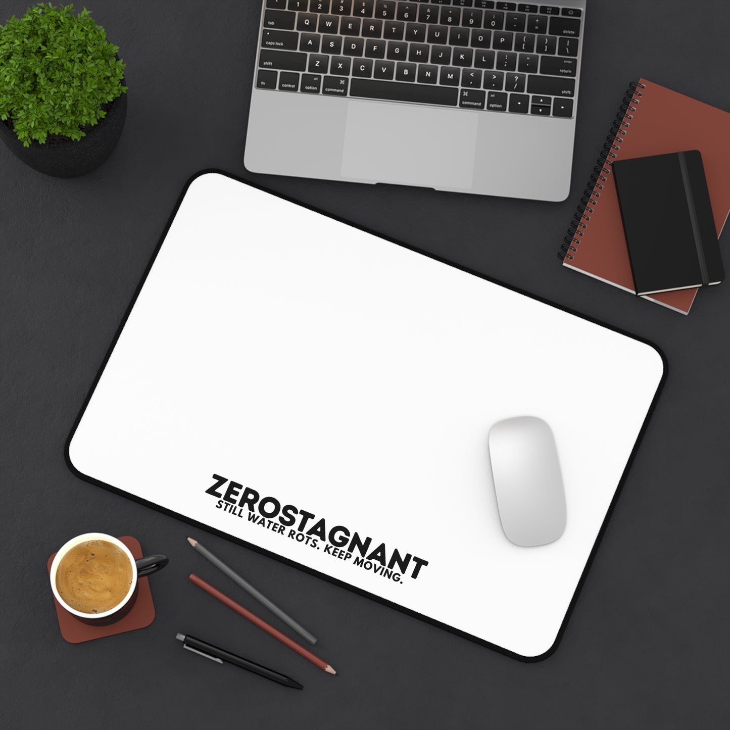 Desk Mat — "ZEROSTAGNANT: Still Water Rots. Keep Moving."