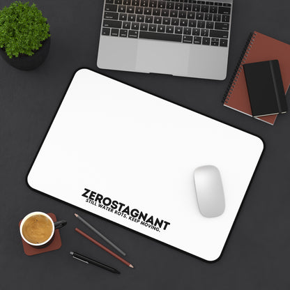 Desk Mat — "ZEROSTAGNANT: Still Water Rots. Keep Moving."