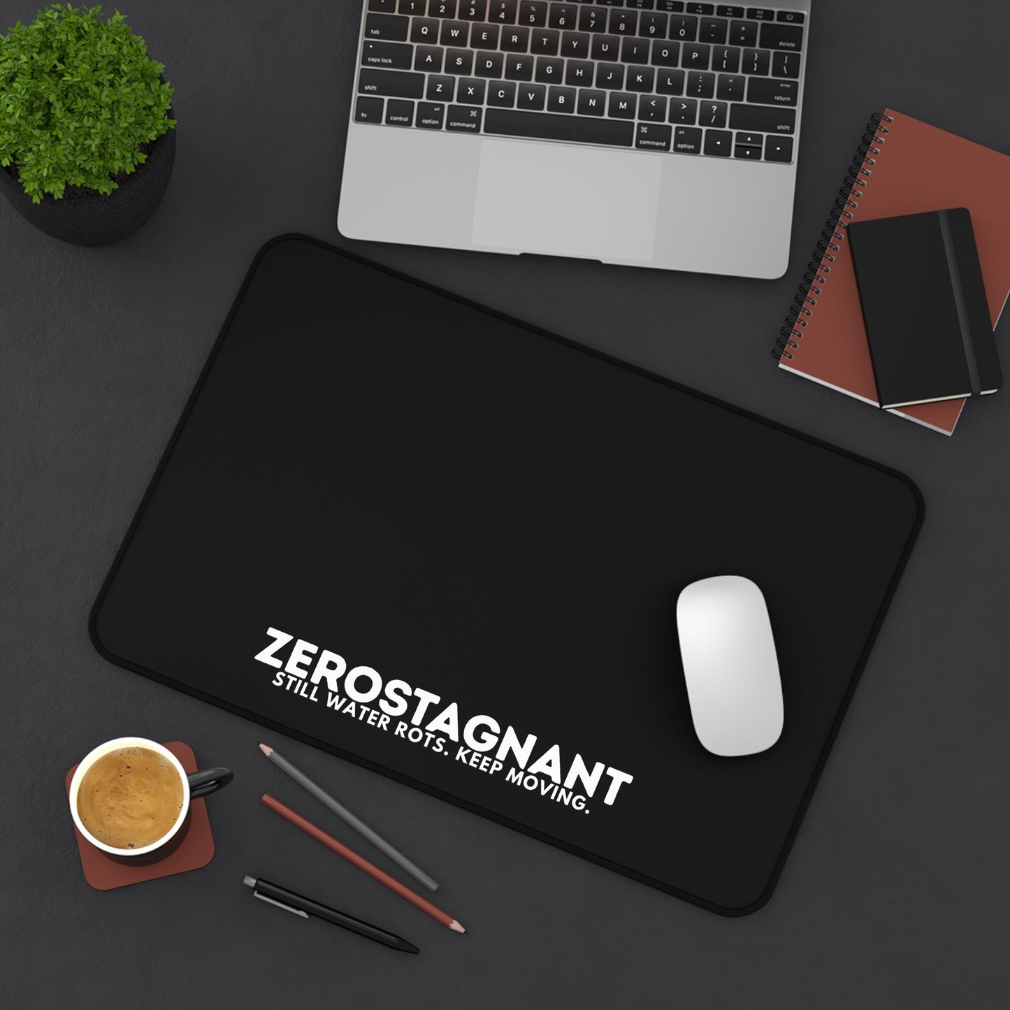 Desk Mat — "ZEROSTAGNANT: Still Water Rots. Keep Moving."