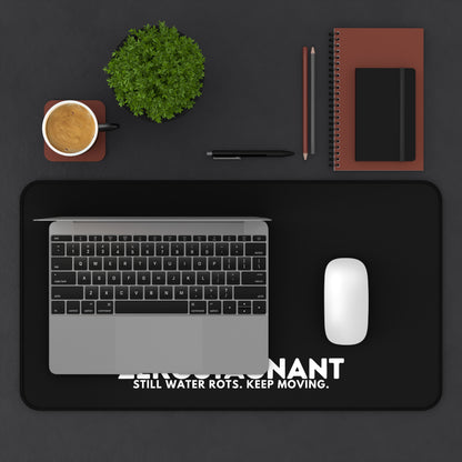 Desk Mat — "ZEROSTAGNANT: Still Water Rots. Keep Moving."
