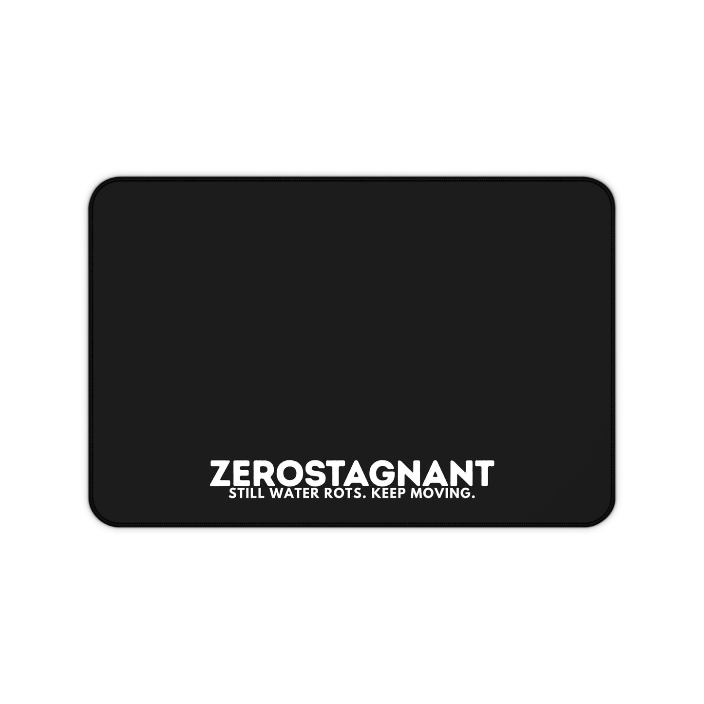 Desk Mat — "ZEROSTAGNANT: Still Water Rots. Keep Moving."